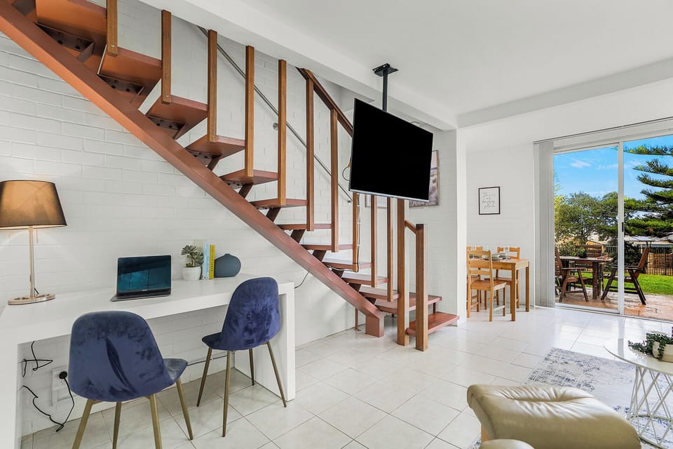 Dedicated work space under stairs