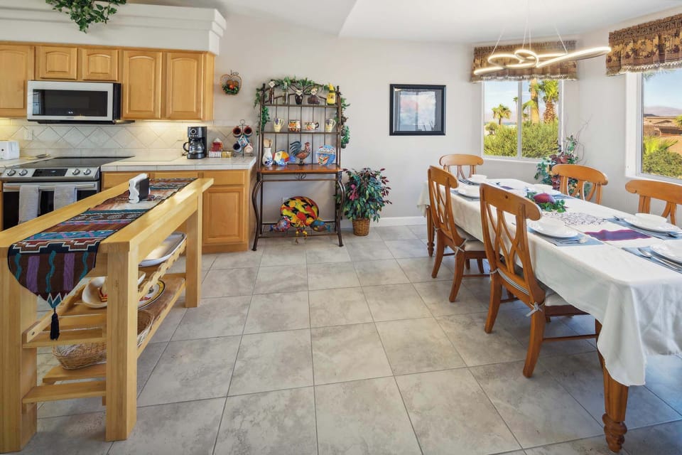 Gather for meals with a lake view at the dining table, seating 6