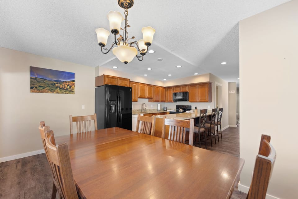 Gather around your spacious dining table while home-cooked meals fill the air from your fully equipped kitchen with granite countertops.