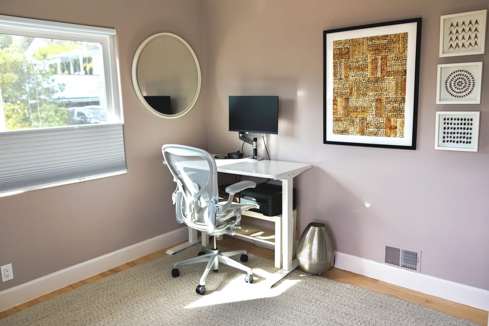 Set up for optional work, w/ motorized standing desk, Herman Miller Aeron chair 