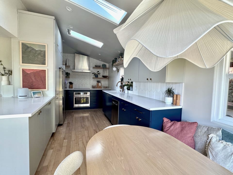 Spacious kitchen with custom cabinetry and new appliances