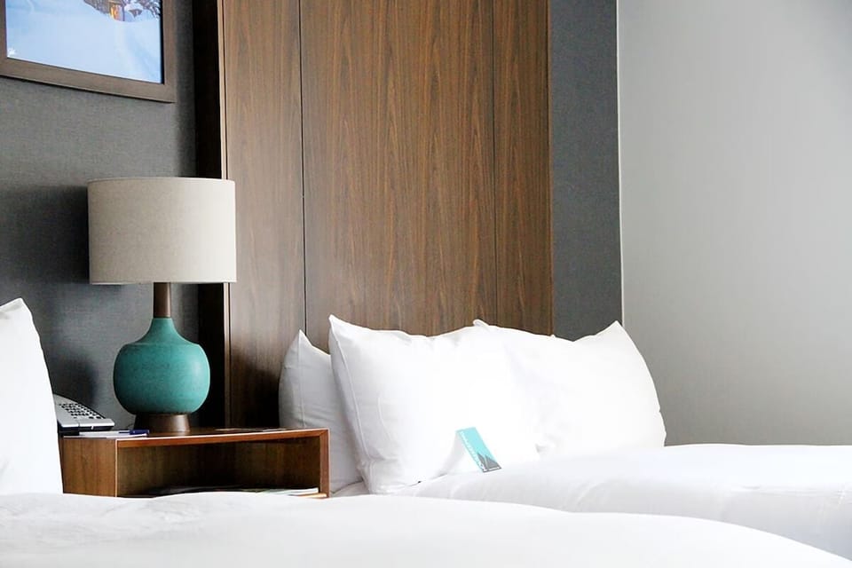 Unit with 2 Queen beds. Exact unit will be assigned upon arrival. Views, colors, and decor may vary.