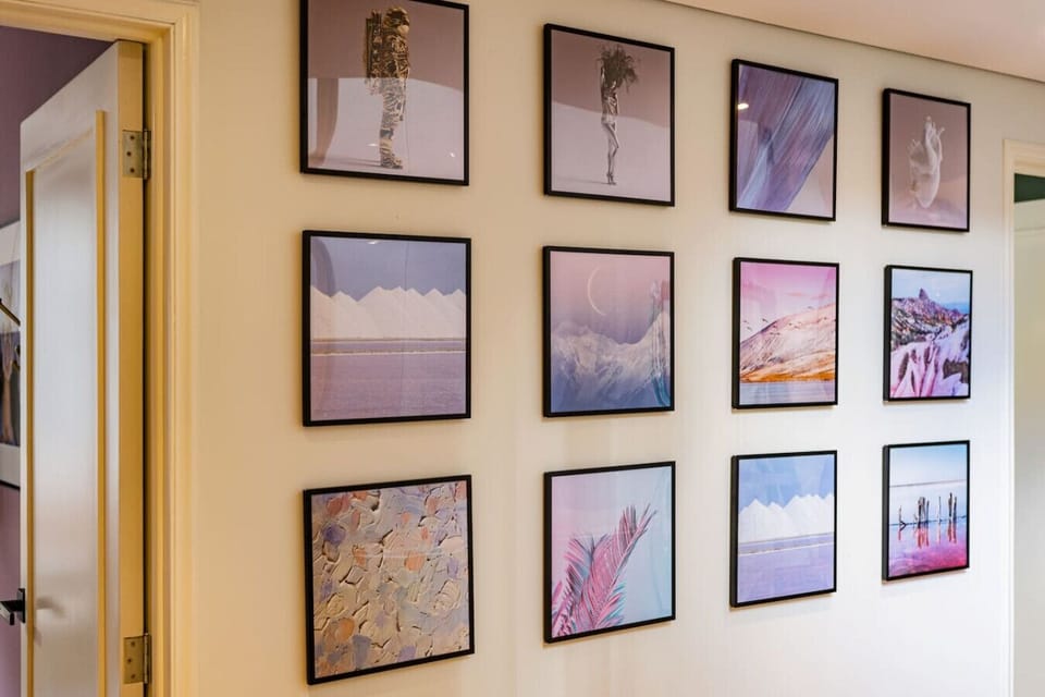 Gallery vibes down every hallway.