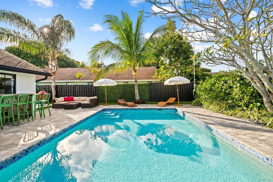 Enjoy our tranquil backyard oasis lounging by the pool