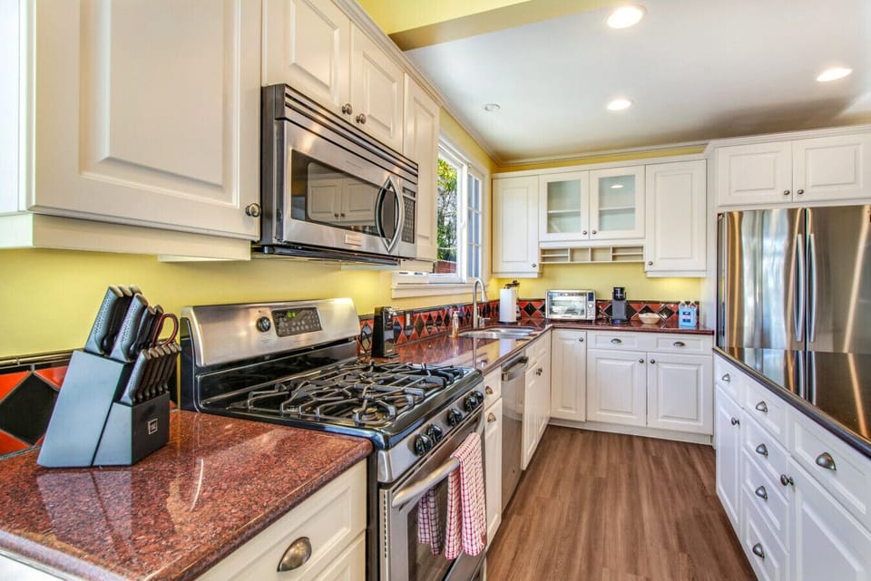 Fully stocked kitchen with cooking supplies