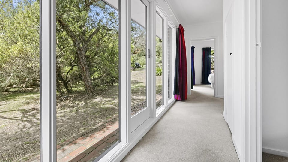 Light filled hallway to the two bedrooms and bathrooms. 