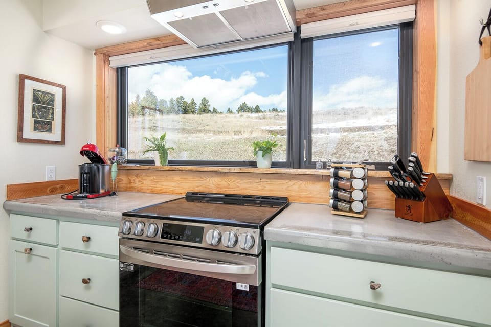 Kitchen window with view of Mount Baldy - concrete countertops
