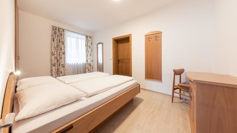 Bedroom with beds made up
