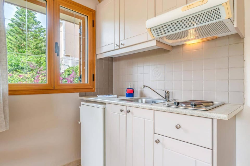 Kitchenette with a view to property grounds