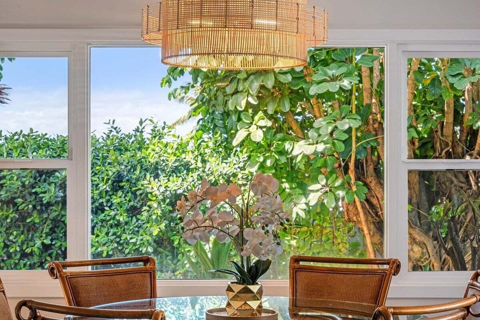Create lasting memories in a cozy dining area with elegant furnishings and outdoor views.