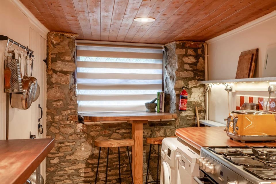 Please note, the kitchen has a low ceiling.