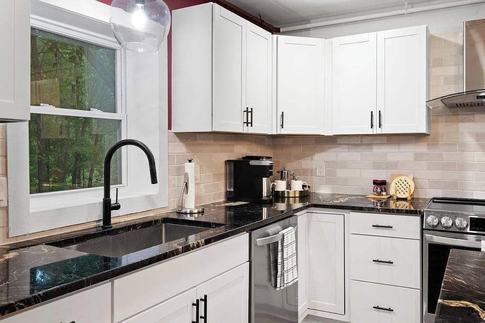 Featuring tons of cabinetry for all your culinary needs.