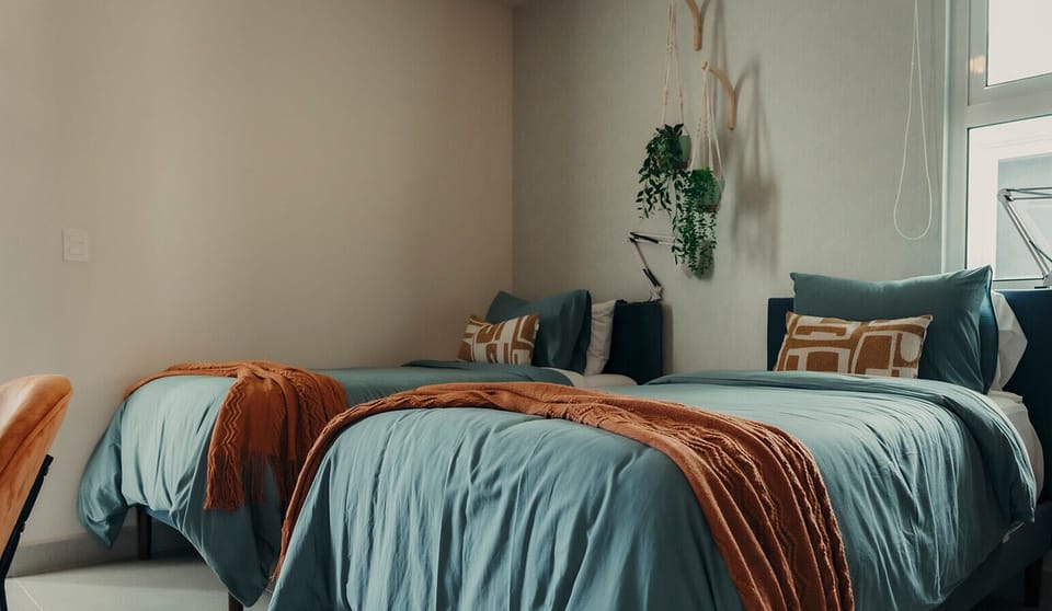 Wake up refreshed in this cozy bedroom.