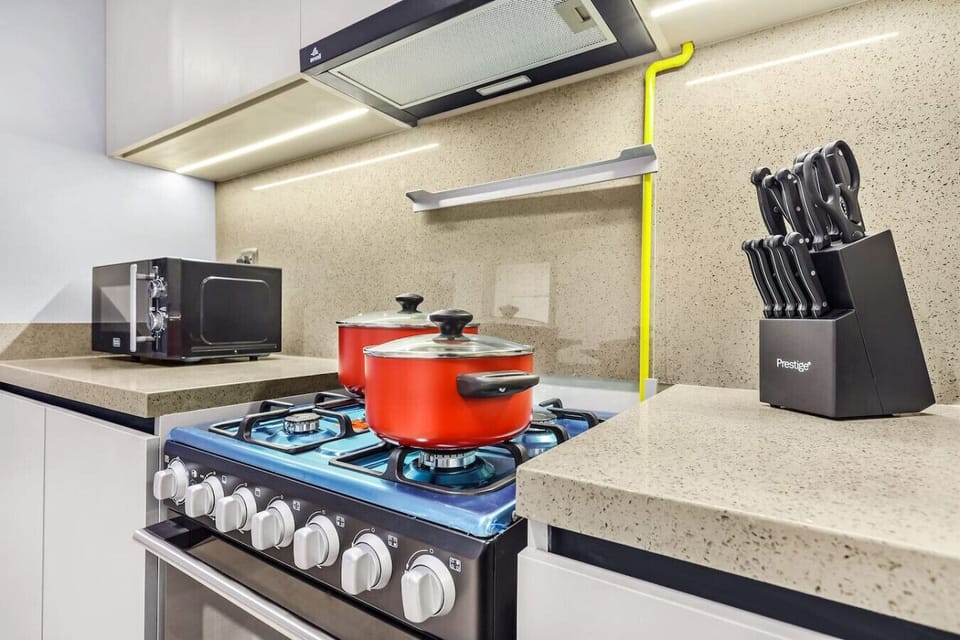 Modern Kitchen: Whip up culinary delights in this stylish, fully equipped space!