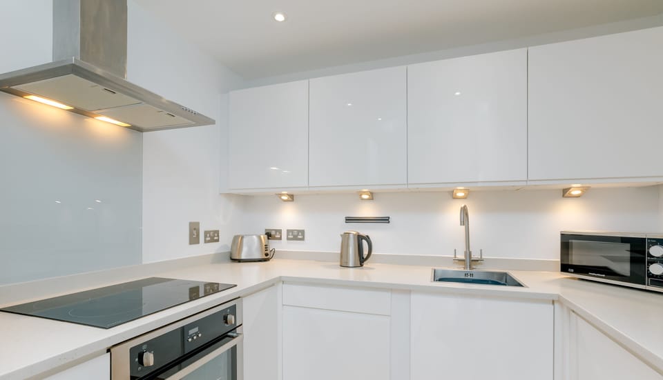 The kitchen is stylish and is fully equipped for our guests