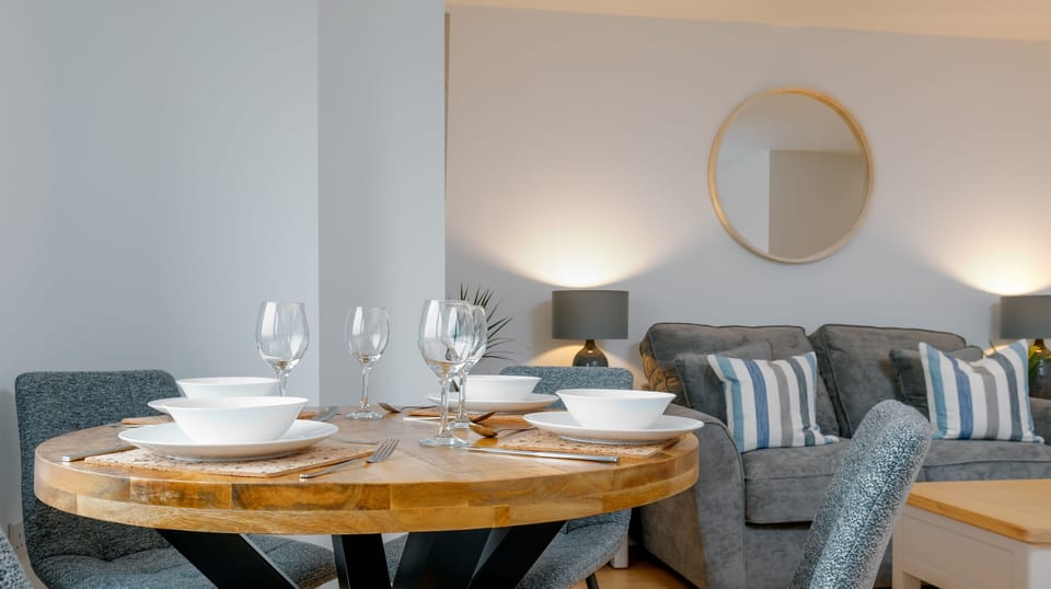 The table is close to the kitchen making it efficient for every day use
