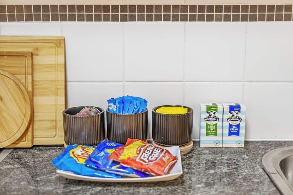 Start your day right! We provide complimentary tea, coffee, sugar, and milk for your convenience.