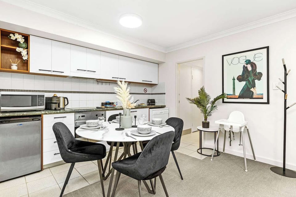 Your functional kitchen and chic dining space, ready for morning coffee or an evening meal.