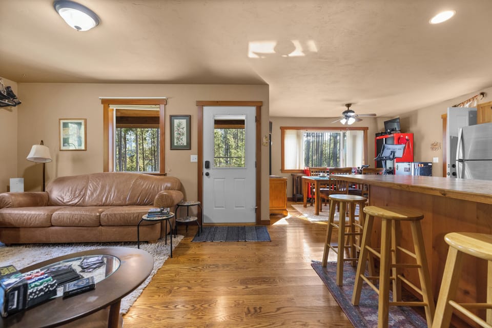 Cozy vibes and warm nights await in this living room. Whether it's movie marathons or quiet evenings by the fire, this space is all about comfort and relaxation.