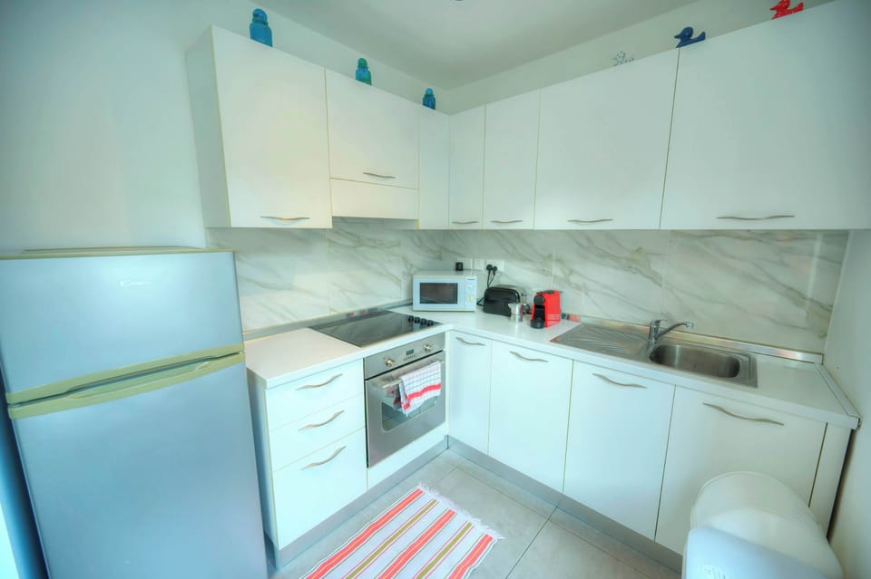 Fully Equipped Kitchen with Stove, Oven, & Fridge Freezer