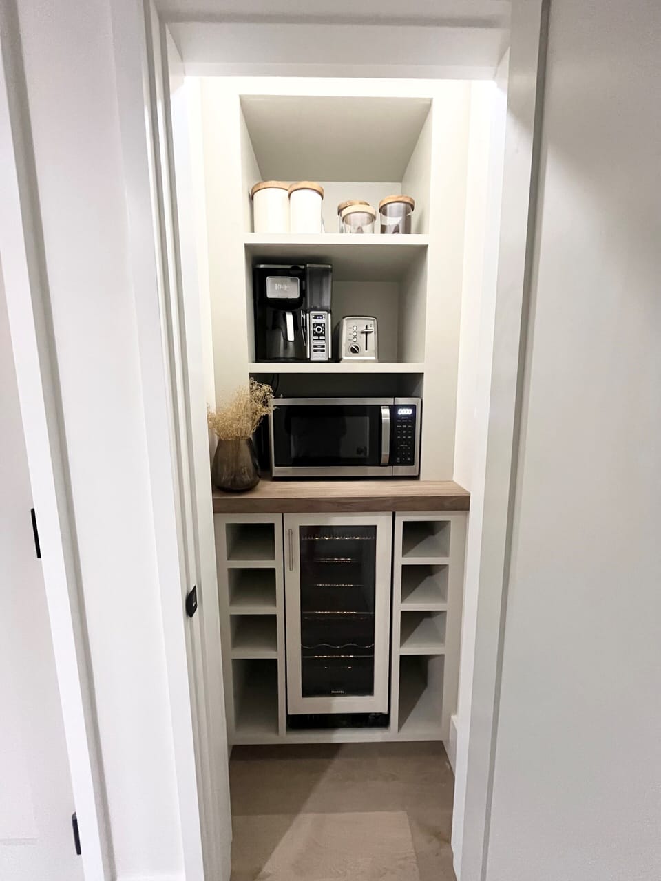 Pantry with wine fridge 