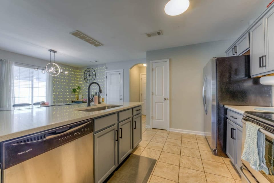 Kitchen looking into coffee bar