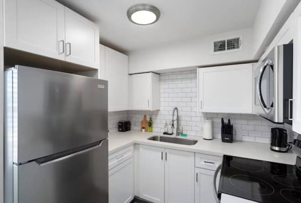 As you step into the kitchen, the clean lines and functional design make you eager to start cooking your favorite dishes.