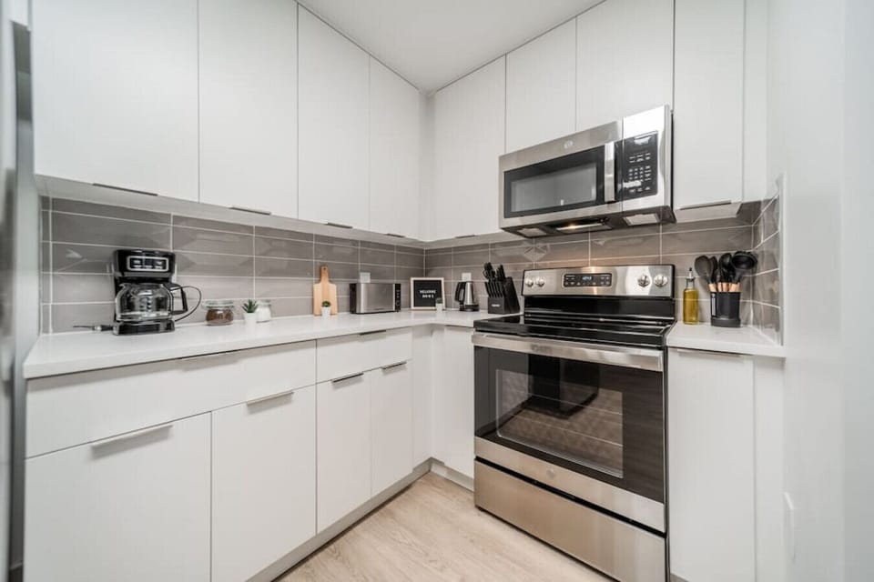 As you approach kitchen the elegant layout and well-stocked shelves make it the ideal spot to relax.