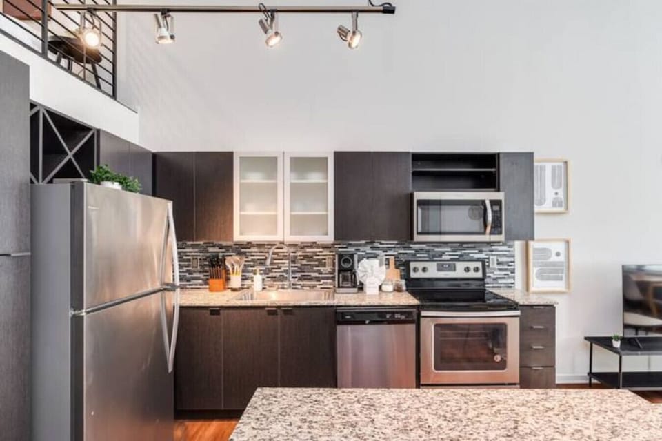As you approach kitchen the elegant layout and well-stocked shelves make it the ideal spot to relax.