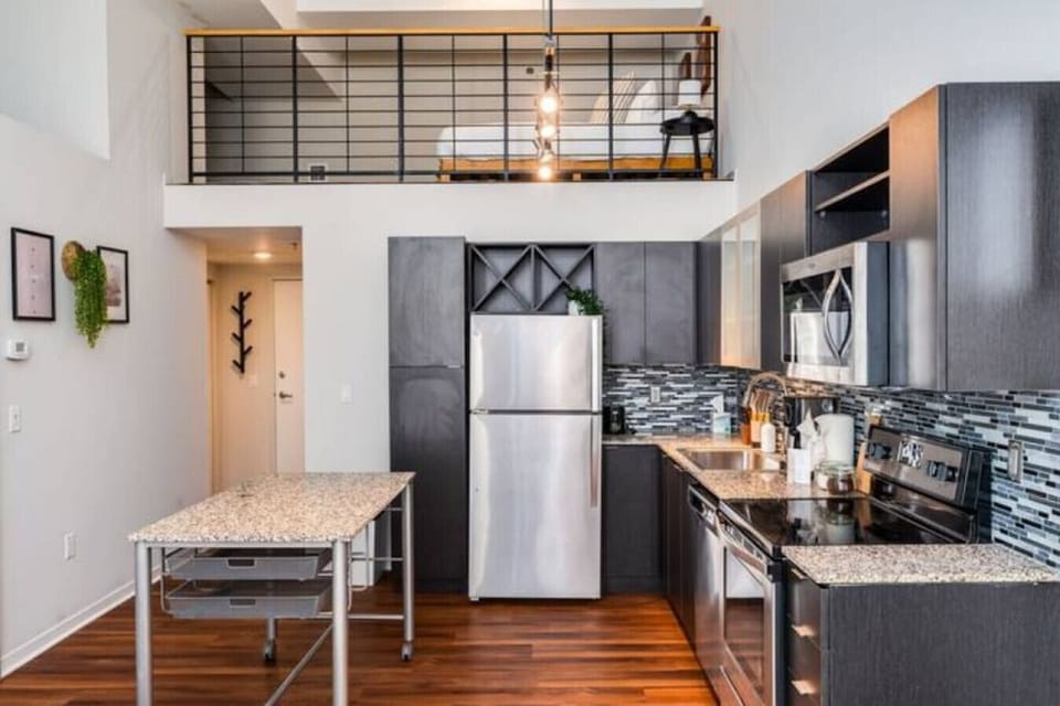 The kitchen’s open layout allows you to move freely as you prepare meals, with everything you need at your fingertips.