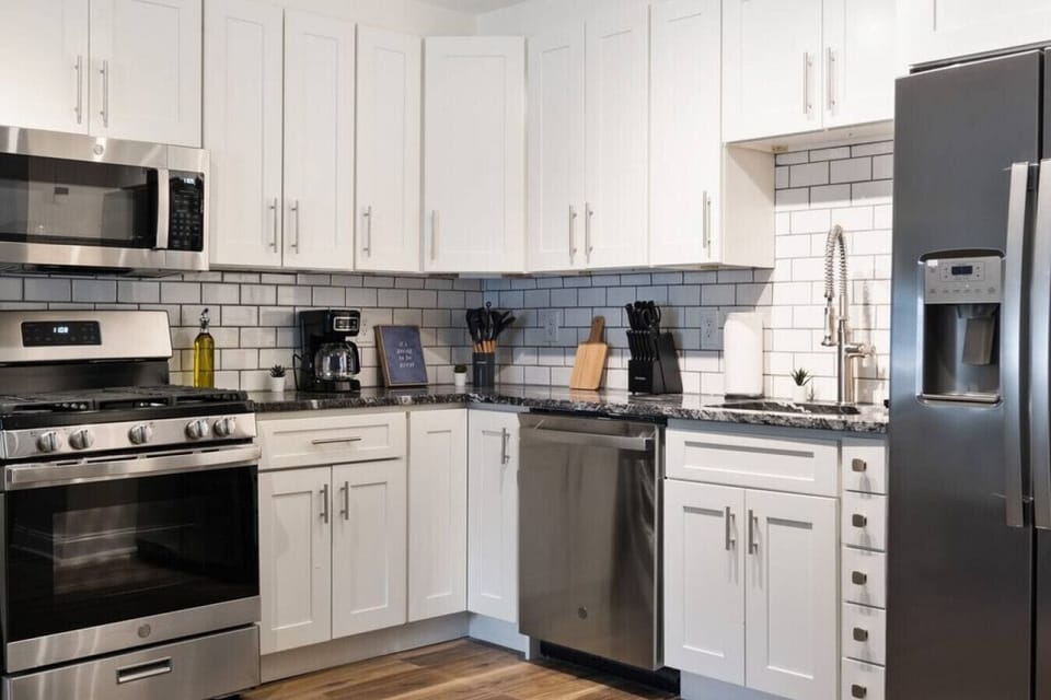 As you approach kitchen the elegant layout and well-stocked shelves make it the ideal spot to relax.