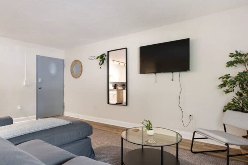 Relax in the living room and watch your favorite shows, lounging is a great way to unwind after a long day.