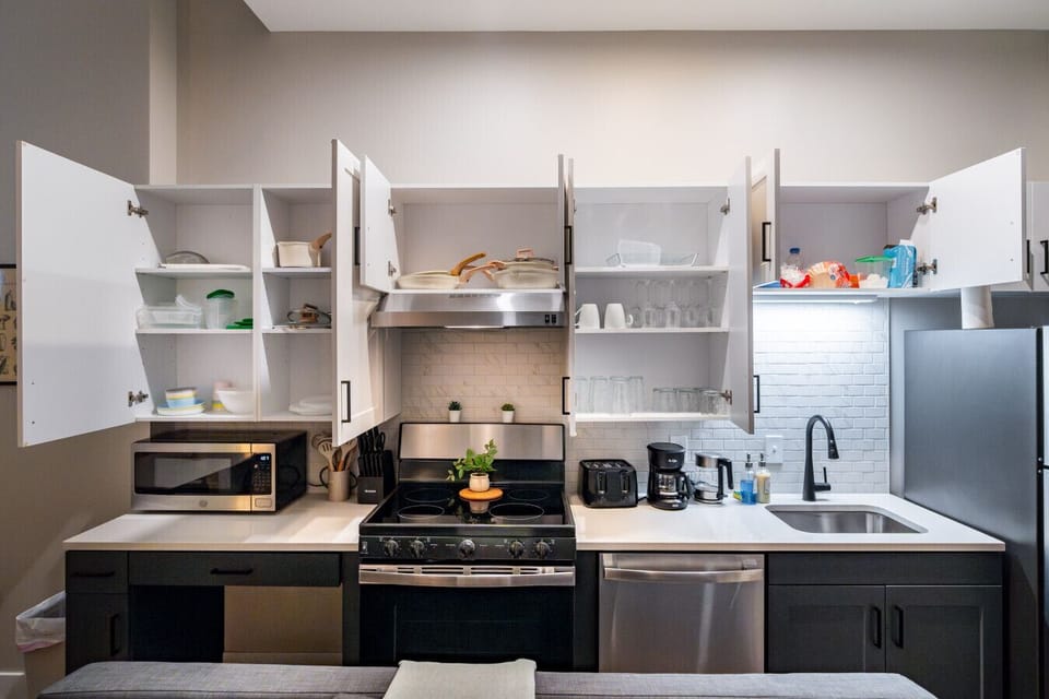 As you approach kitchen the elegant layout and well-stocked shelves make it the ideal spot to relax.