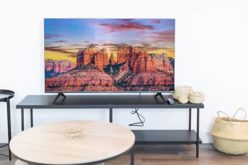 Relax in the living room and watch your favorite shows, lounging is a great way to unwind after a long day.