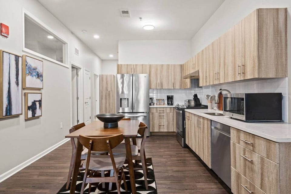 The spacious dining room invites you to savor every moment, whether enjoying a quiet meal or hosting a festive gathering.