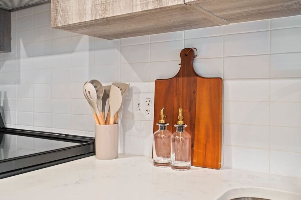 Fully equipped kitchen with all the tools you need for a perfect culinary experience. Enjoy the convenience of having everything at your fingertips!