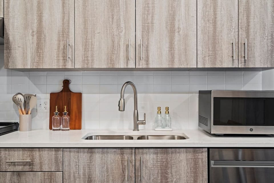 As you step into the kitchen, the clean lines and functional design make you eager to start cooking your favorite dishes.