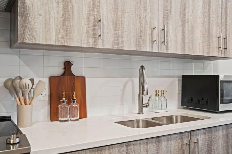 As you step into the kitchen, the clean lines and functional design make you eager to start cooking your favorite dishes.