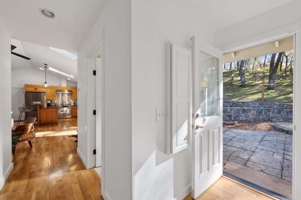 Step inside to a bright entryway that opens to a private patio and flows into the spacious kitchen and living area.