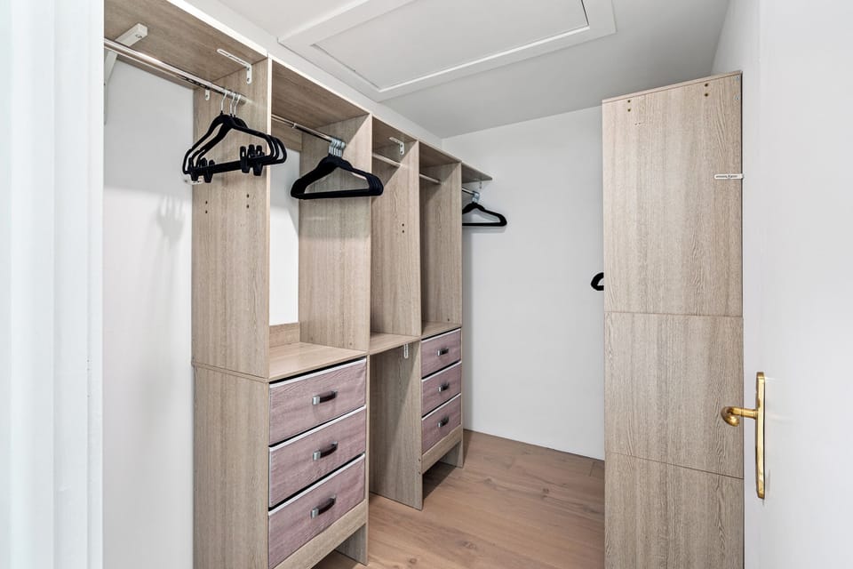 There is plenty of room to unpack your belongings in the upstairs master bedroom closet.