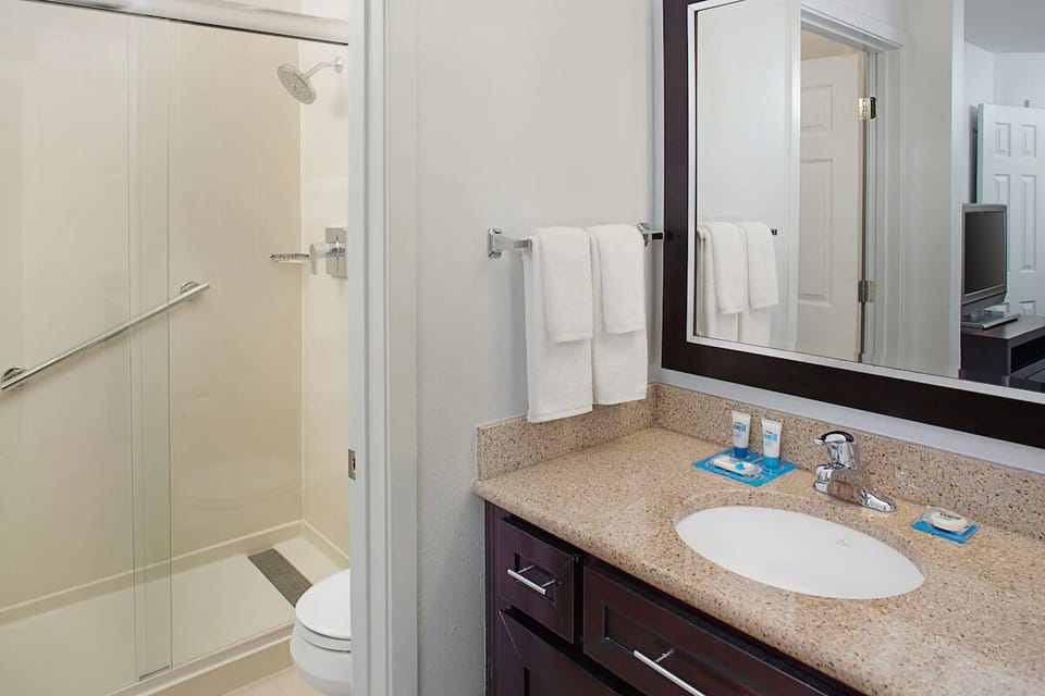 Refresh under a roomy shower after a day exploring.