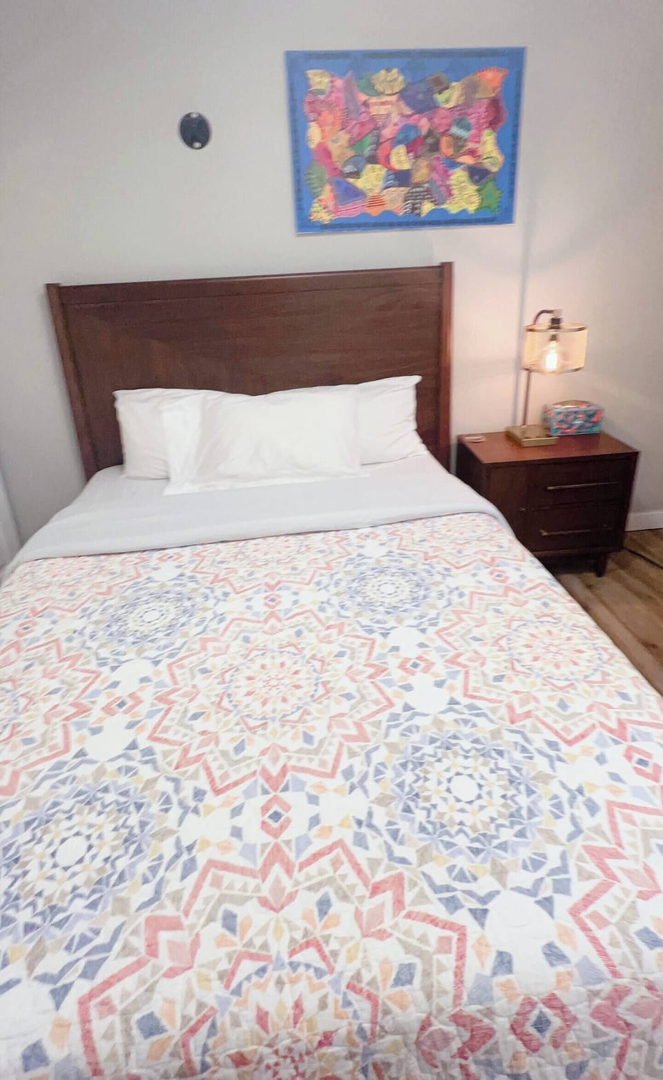 Third bedroom with queen bed and work station.