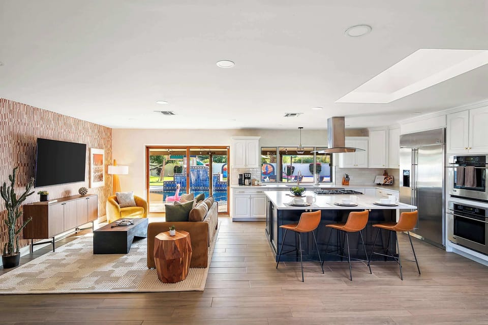 Seamless flow from the living room to the kitchen—perfect for socializing, cooking, and relaxing all in one open space! 