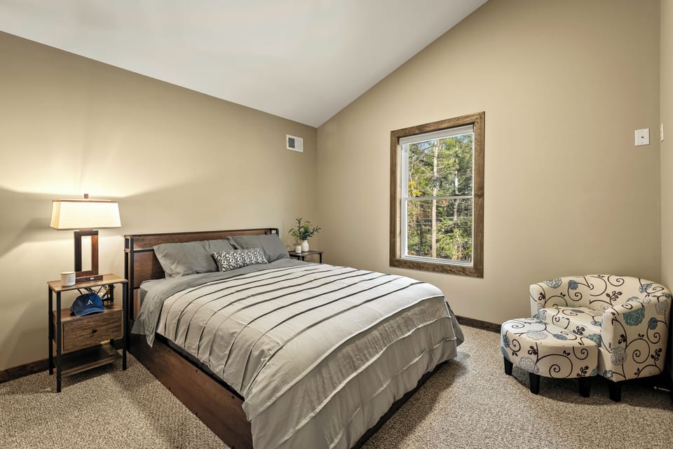 Primary bedroom features a queen bed.