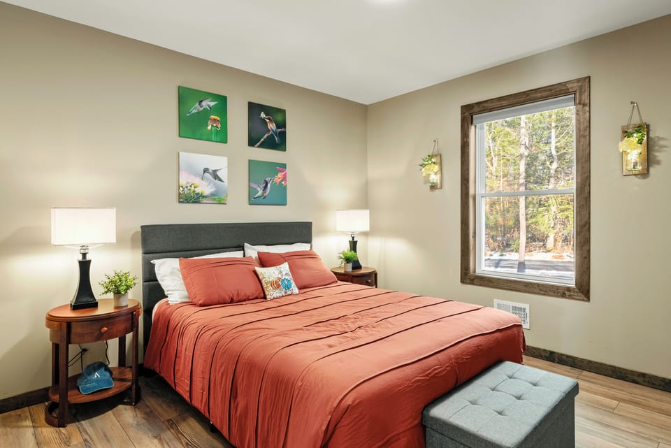 Bedroom 2 features a queen bed.