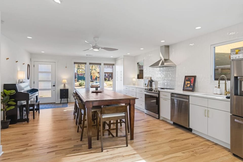 The kitchen is fully equipped with high-end appliances and all the cooking essentials you may need. Enjoy meals at the dining table.