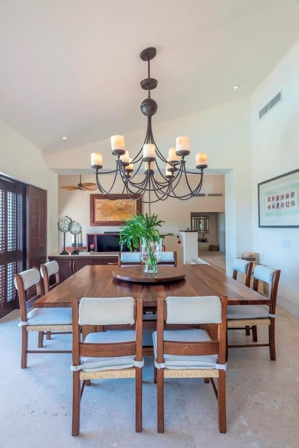 Elegant dining room with handcrafted wooden table for eight at FSPV2040 Villa Amara