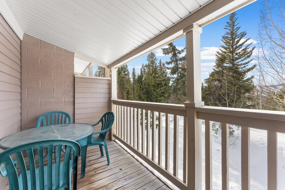 Step onto your private covered balcony where morning coffee tastes better with snowy forest views and fresh mountain air.