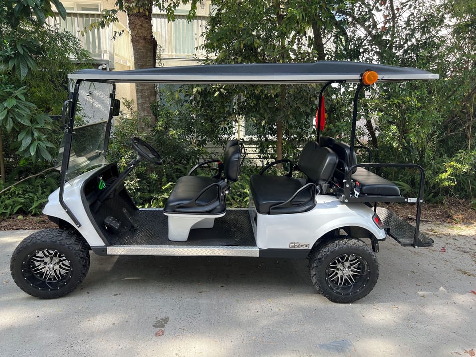 6 Passenger Golf Cart Included!