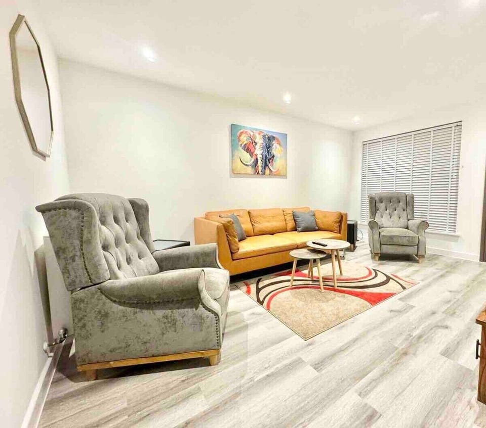 Living area with plenty seating and large 43' Smart TV